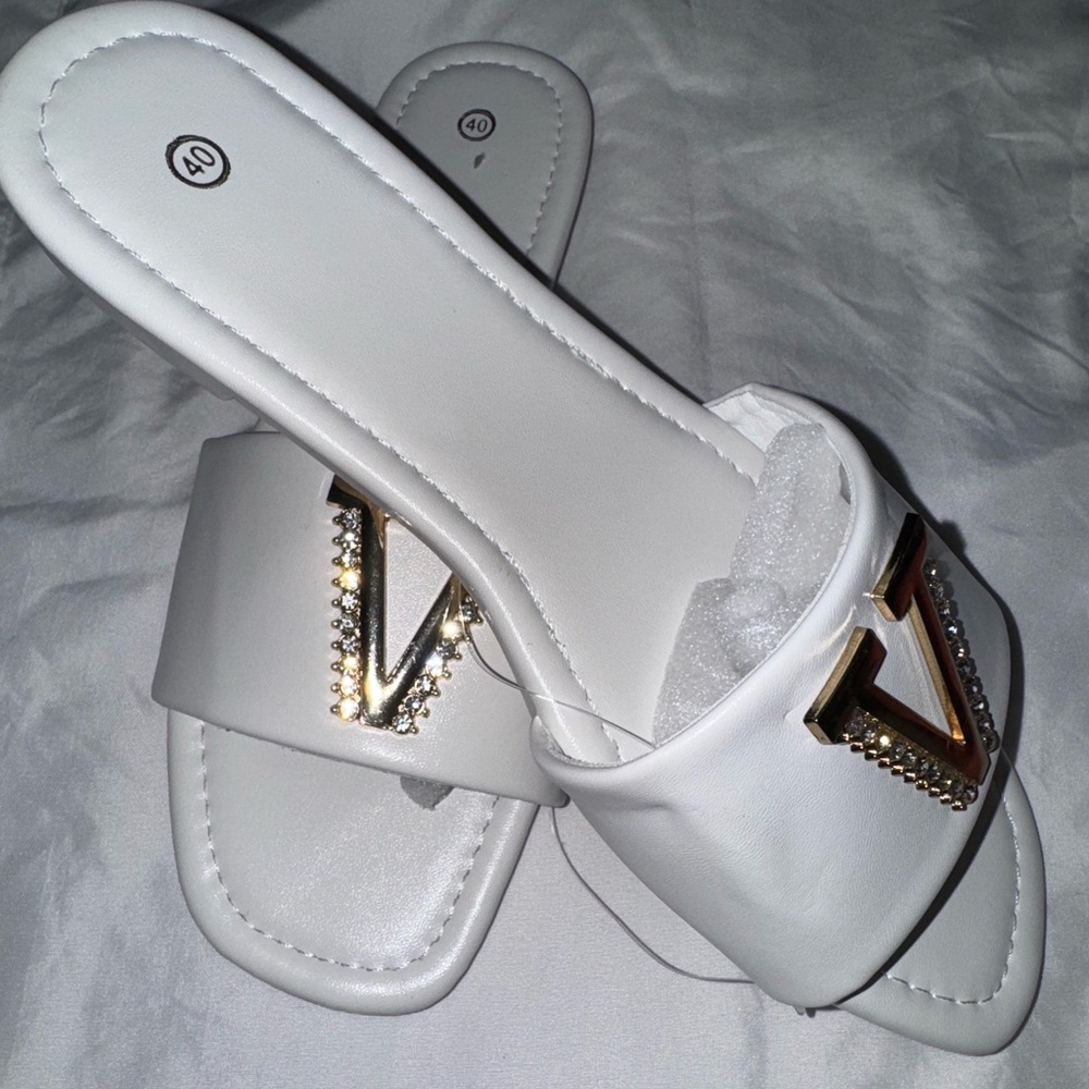 Chic White Slide Sandals with Gold Accents